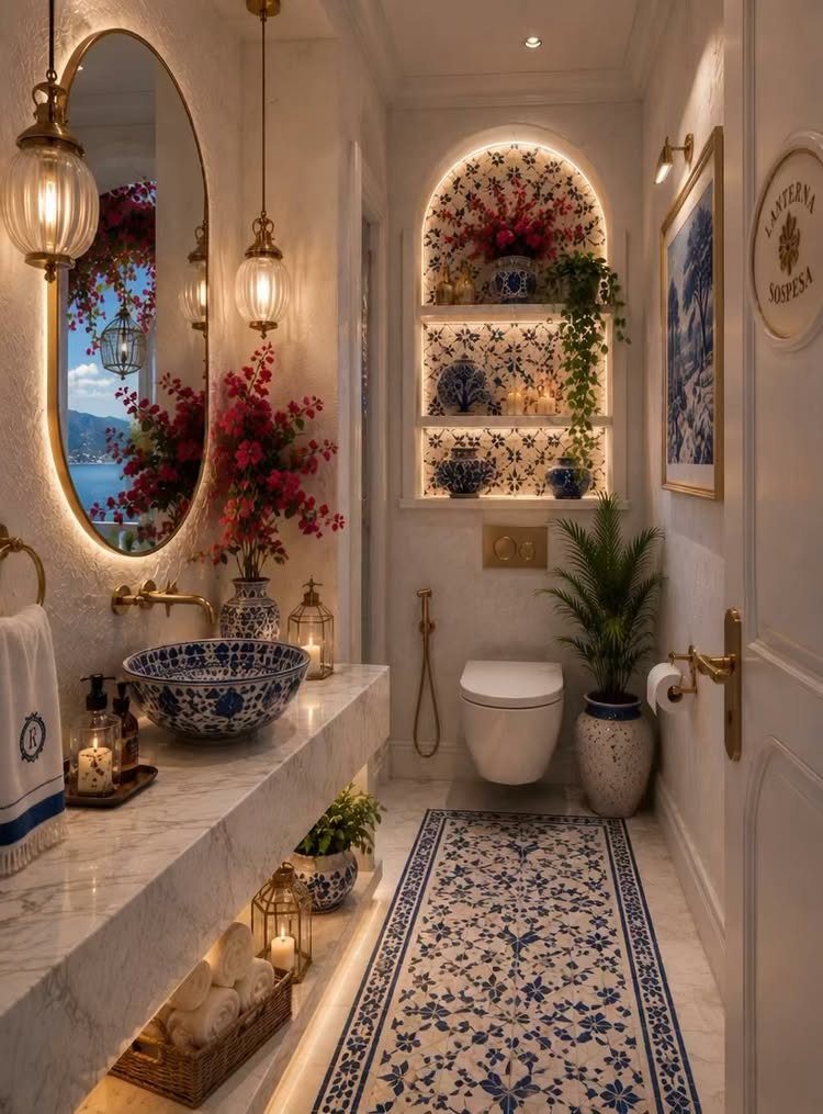 14 Home Decor Blue Ideas for Sofas, Walls, Kitchens and Baths 2 Blue and white patterned sink and rug in a bright, classic white bathroom.