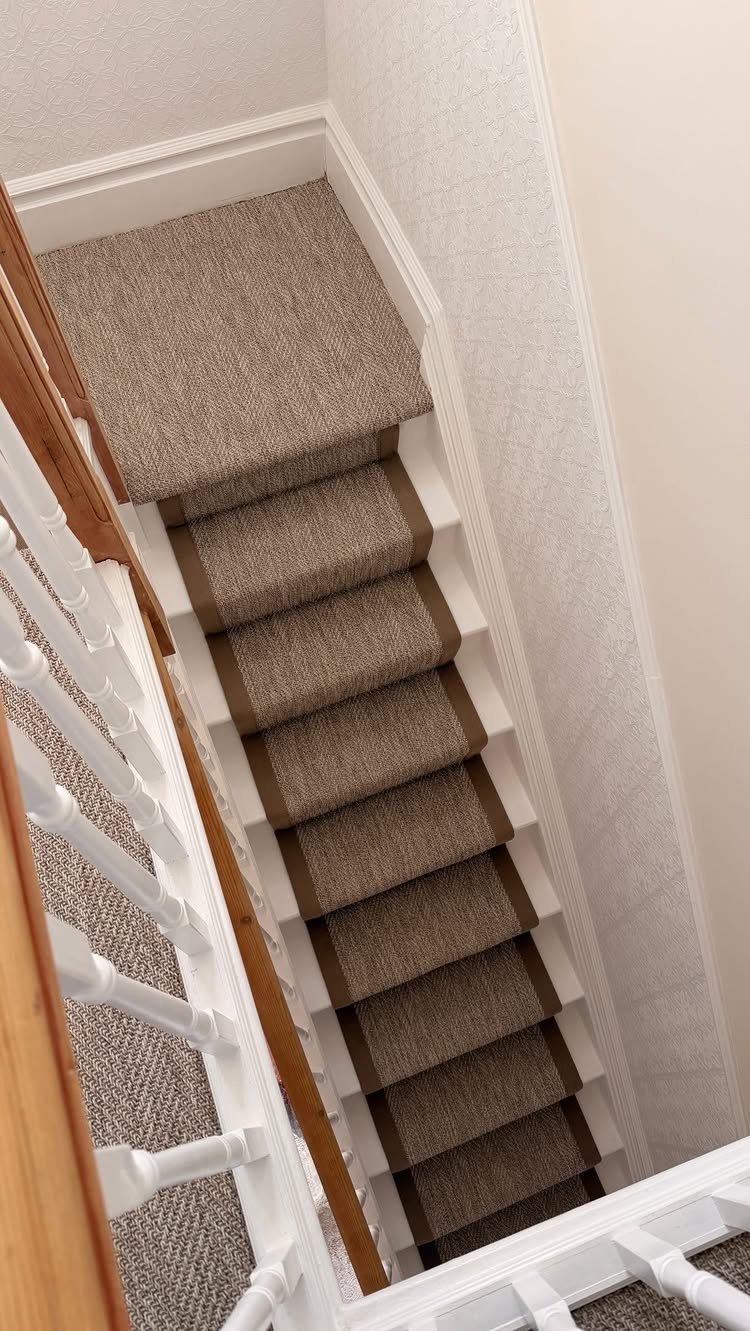 Stairs with Carpet: 23 Styles from Runners to Bold Patterns 6 Beige textured carpet runner on stairs leading to a matching carpeted landing.