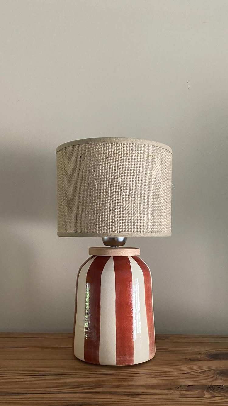 Make Table Lamp Ideas: 14 Designs in Wood, Glass and Ceramic 2 Table lamp with a red and white striped ceramic base and beige shade.