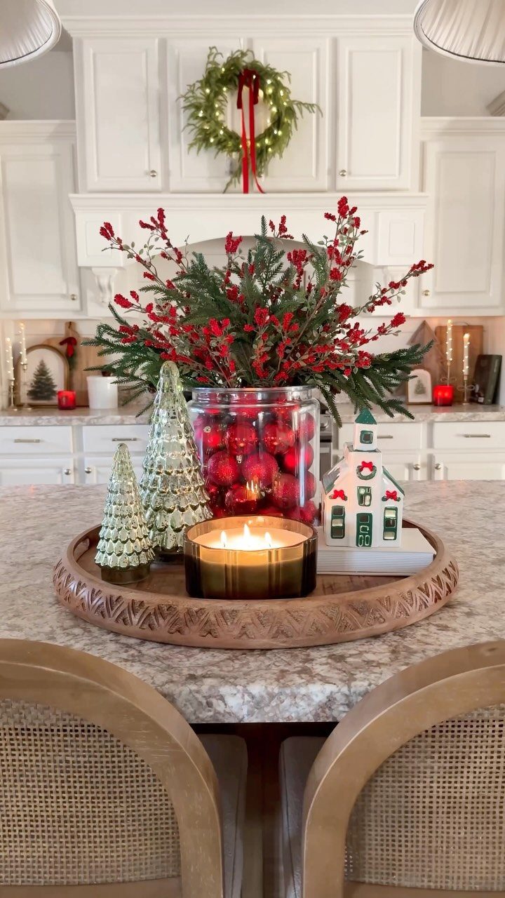 34 Large Floral Arrangement Ideas for Tables, Trays and Vases 8 Festive berry centerpiece with red berries, greenery, and a candle on a wooden tray.