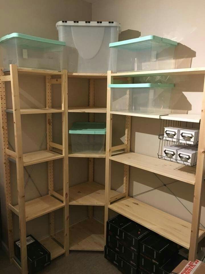 24 Corner Shelves IKEA Ideas for Kitchens, TVs and Plants 17 Light-wood corner shelving units holding clear plastic storage bins and black boxes.