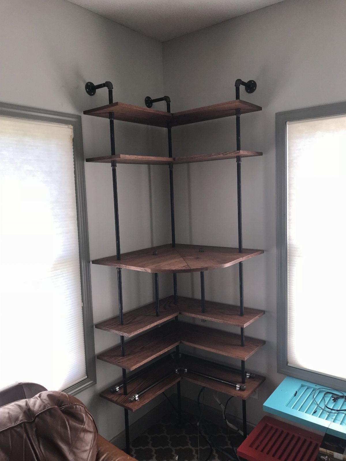 24 Corner Shelves IKEA Ideas for Kitchens, TVs and Plants 12 Industrial pipe corner shelf with dark wood planks and black metal supports.