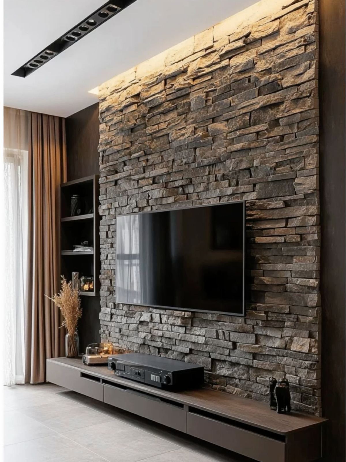 Luxury living room TV unit with a stone feature wall and floating console.