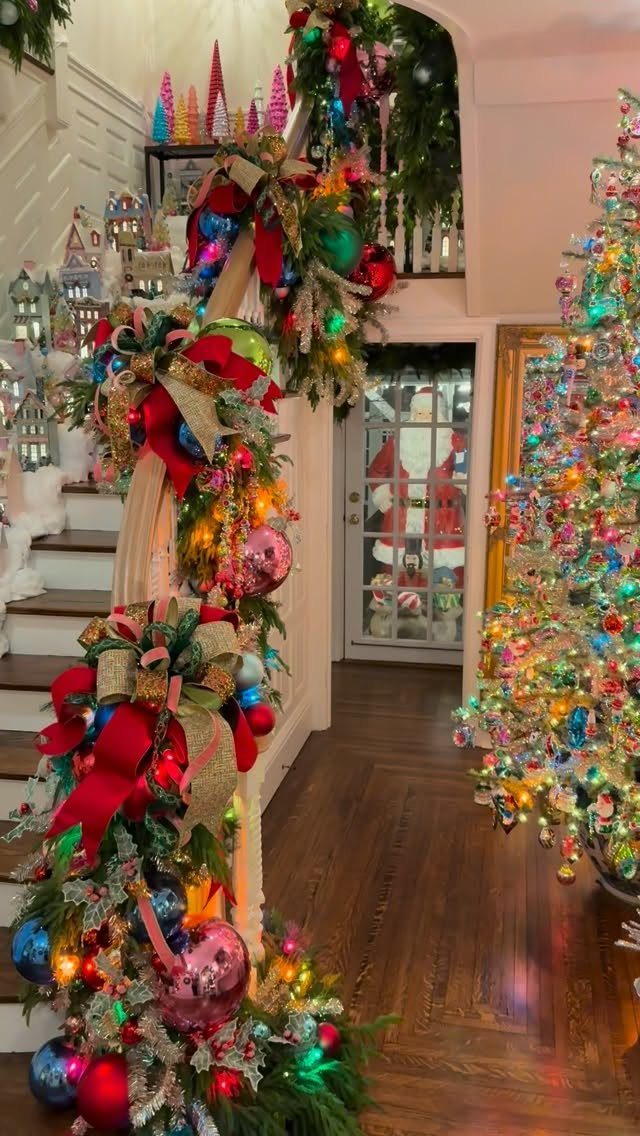 2026 Christmas Theme Ideas: 12 Looks, Heritage to Woodland 8 Colorful Christmas decorations with ornaments and ribbons on a staircase and tree