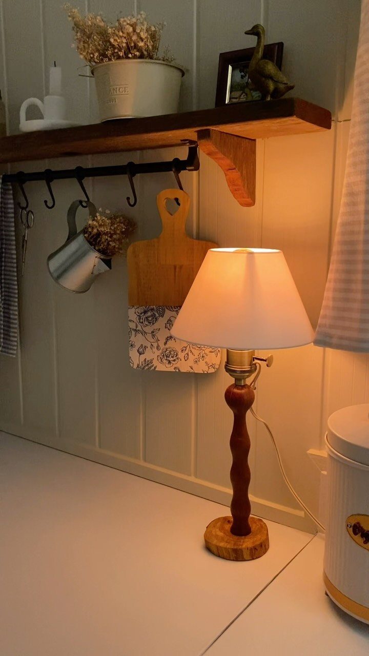 Make Table Lamp Ideas: 14 Designs in Wood, Glass and Ceramic 3 Turned wooden table lamp with a white shade on a white kitchen counter