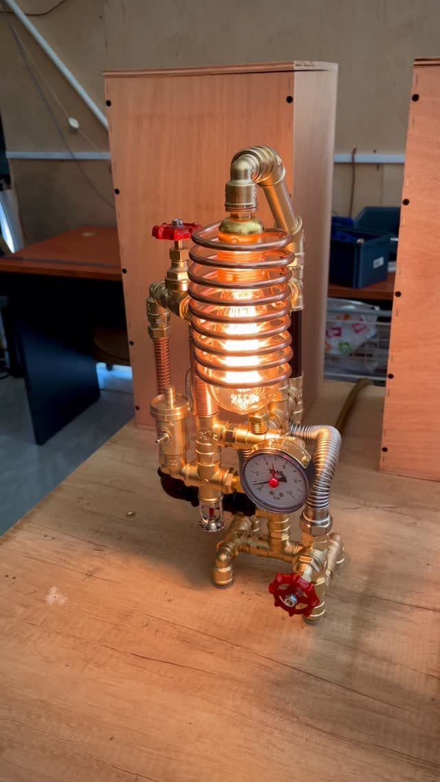 17 Handmade Lamps Ideas Using Wood, Concrete, and Glass Jars 16 Steampunk brass pipe lamp with a glowing Edison bulb and pressure gauge.