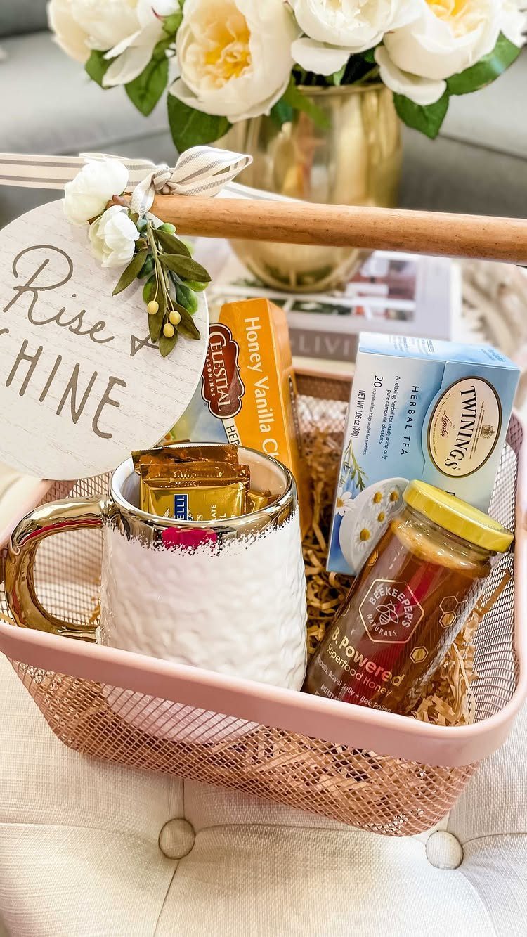 Gift basket with a white mug, honey, and tea boxes for morning treats.